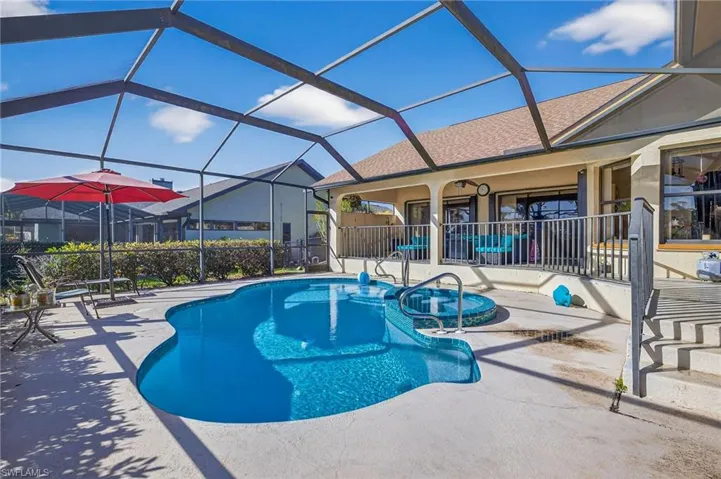 View of pool featuring, patio surround, and a lanai