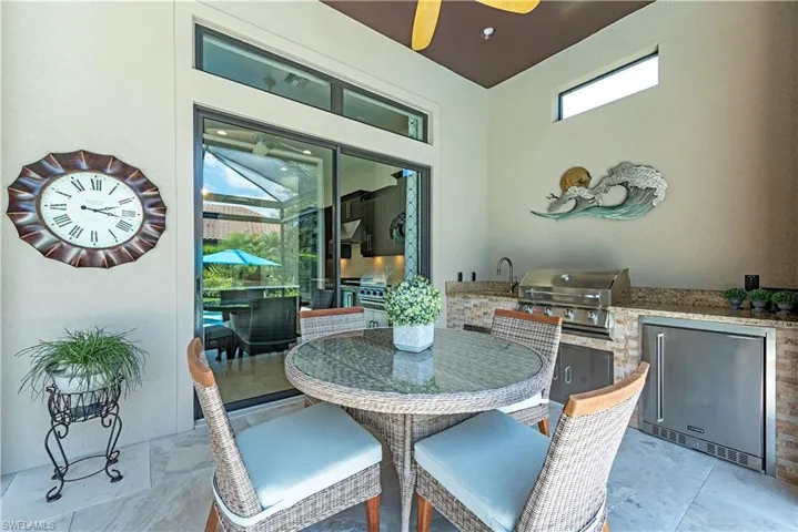 Dining room with ceiling fan and light tile floors