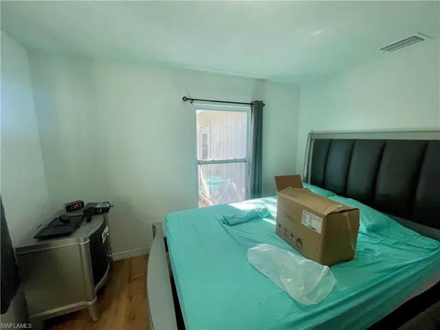 Bedroom featuring light hardwood / wood-style flooring
