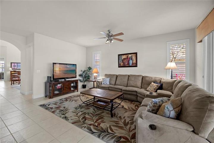 Family room, archway leads to front living area