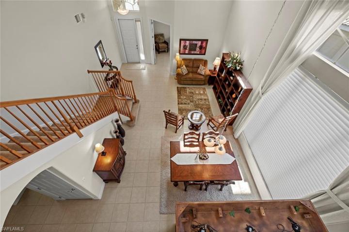 View of front living/dining area from loft