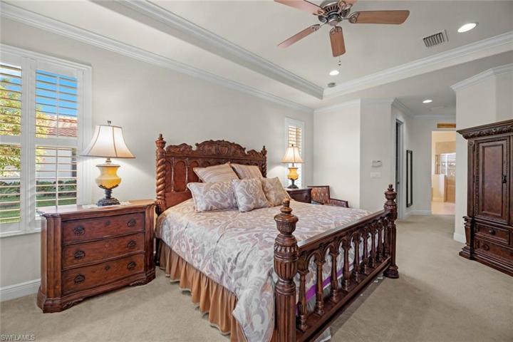 Master suite, hall leads to walk-in closets and master bath