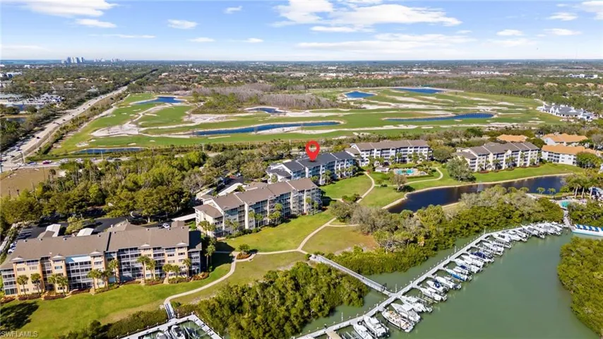 Aerial view of a large body of water and a local golf course