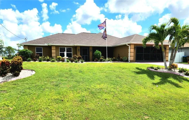 Ranch-style house featuring a front lawn