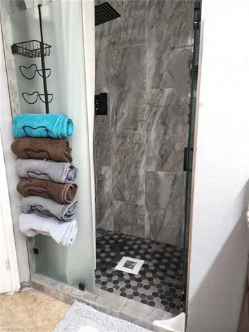 Bathroom featuring an enclosed shower