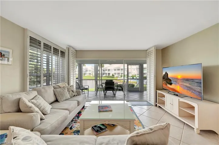 Smart TV and a view of the lake and community pool