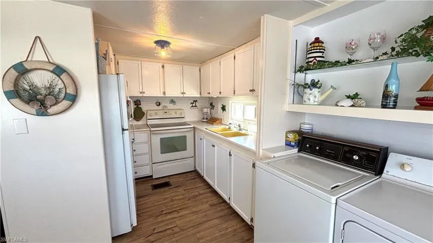 Fully-equipped Kitchen includes microwave.