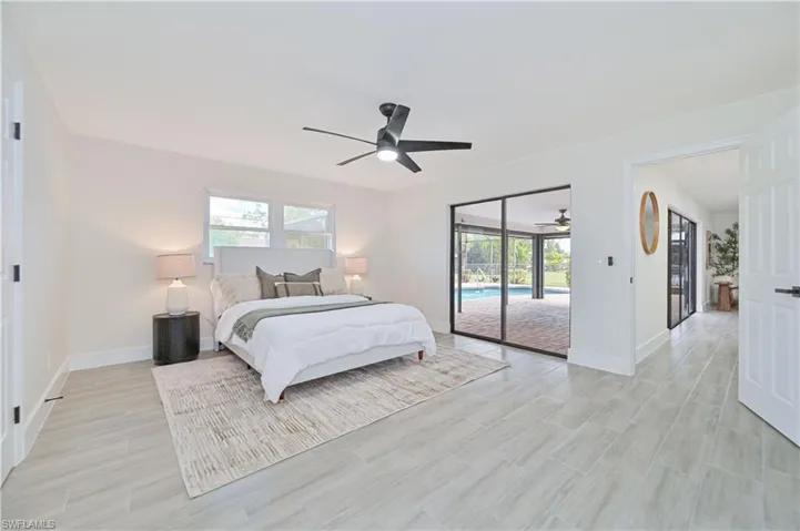 main bedroom step out to the pool