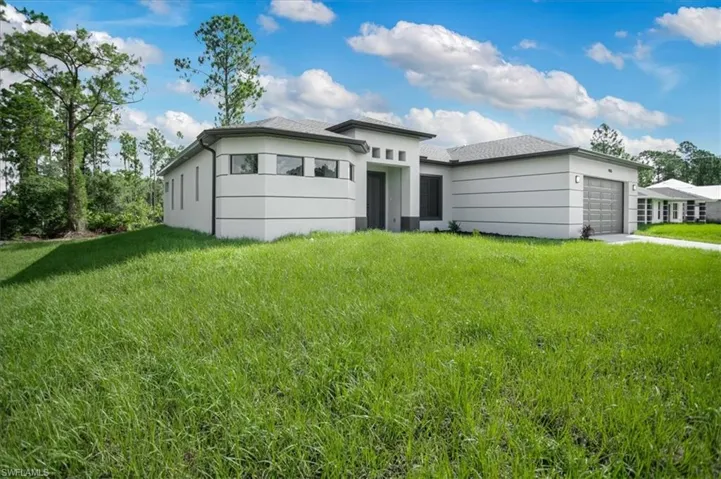 View of shed / structure featuring a yard
