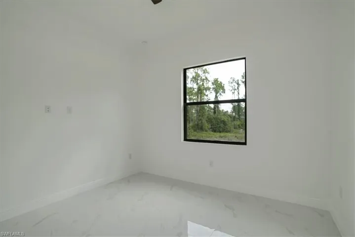 View of tiled spare room