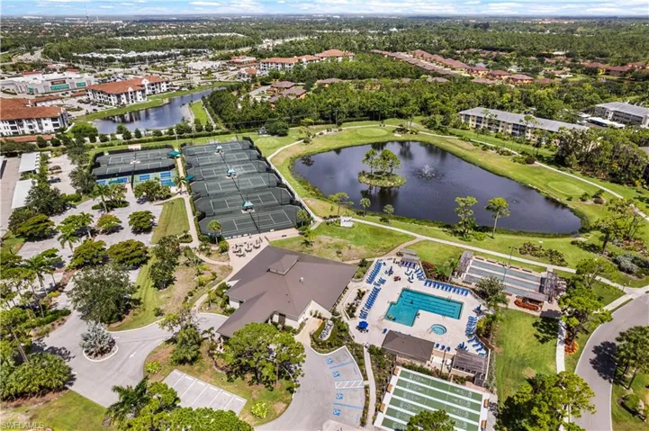 Aerial view featuring a water views and clubhouse area
