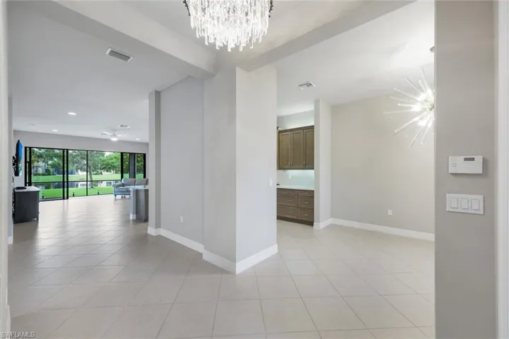 Bright foyer with chandelier