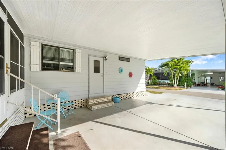 Doorway to property with a patio
