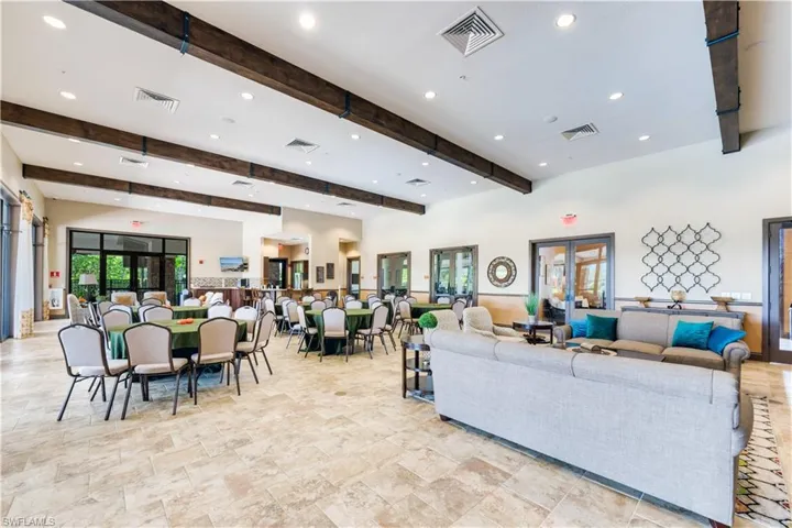 Living room with french doors and beam ceiling