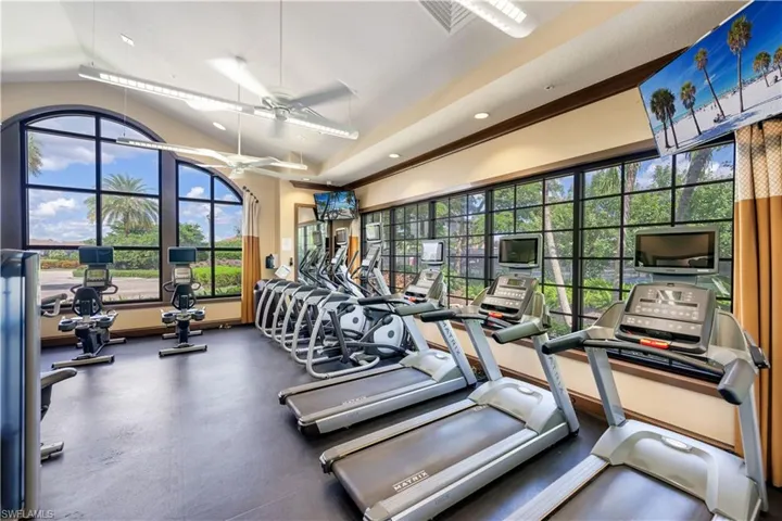 Gym featuring ceiling fan