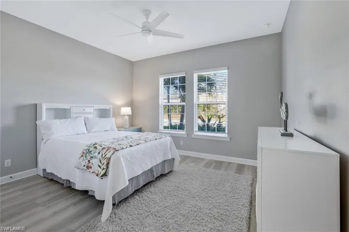 Bedroom featuring light wood-type flooring and ceiling fan