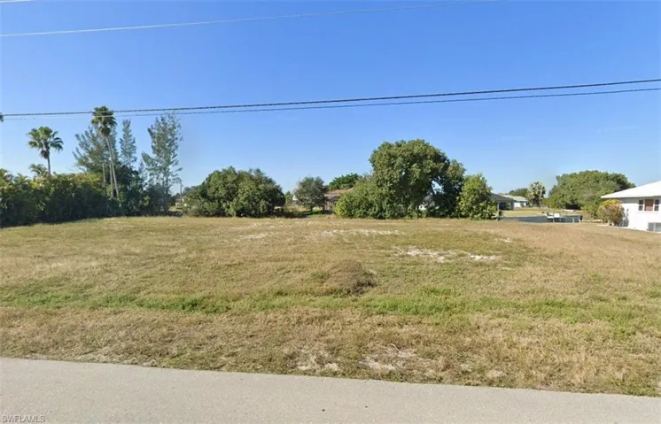 This is a picture of the road frontage of this Freshwater Residential Single Family Building Lot in Cape Coral, Florida.