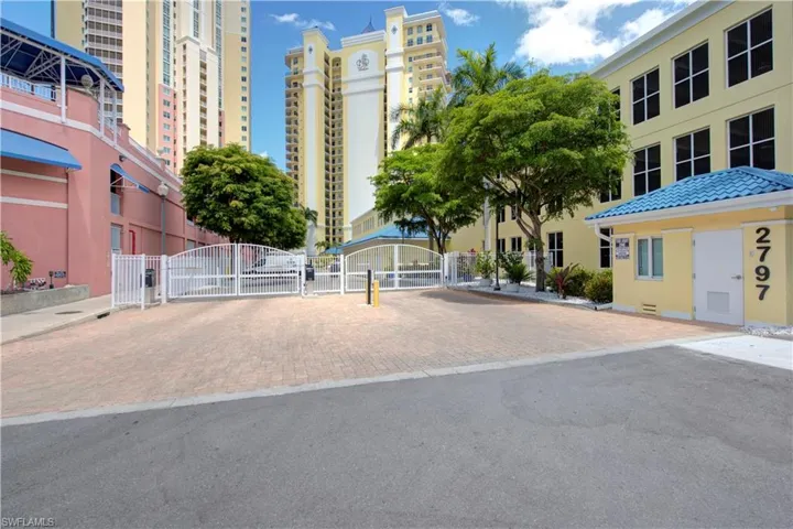 Gates to entrance and gated to parking