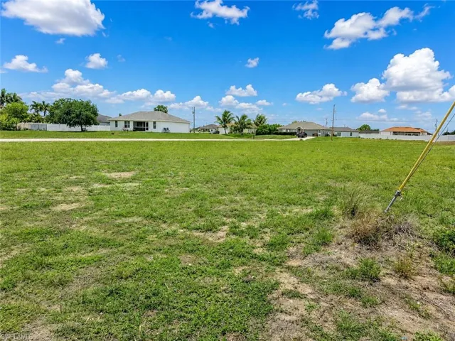 Expansive grassy lot with a level topography