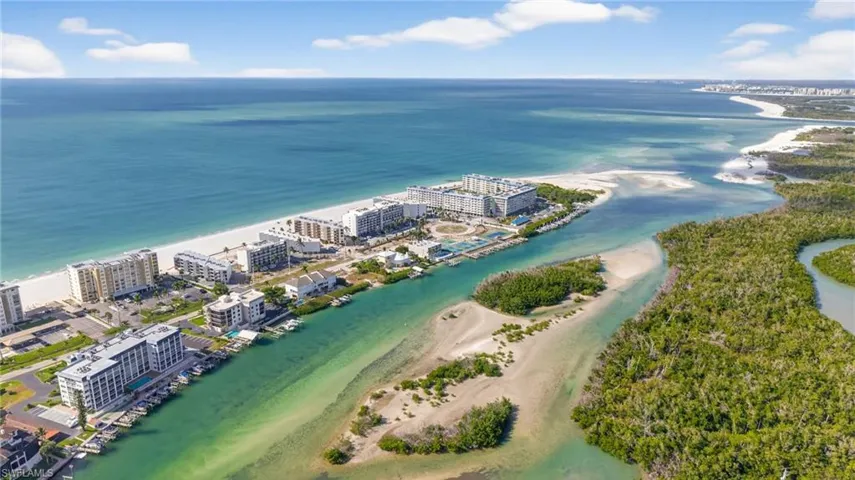 View of urban area with expansive beach