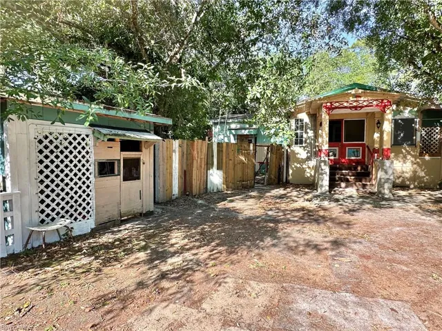 View of yard featuring fence