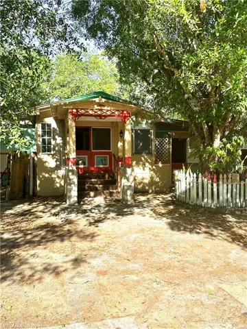 View of front of home with fence
