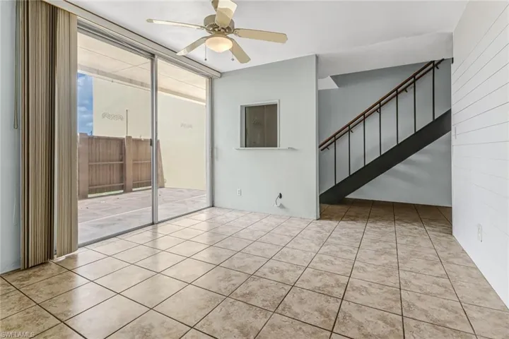 From dining area toward entry and stairwell