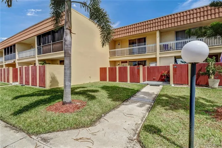 Front of the unit, with private, courtyard entry.