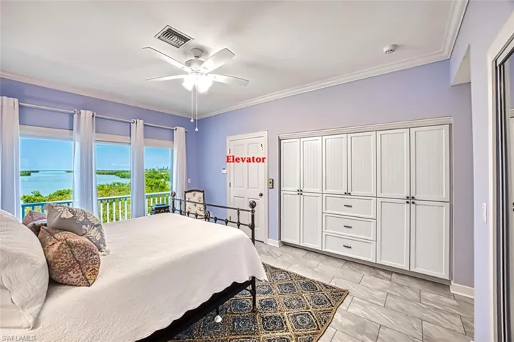 Bedroom with crown molding, access to exterior, a ceiling fan, and light marble finish flooring
