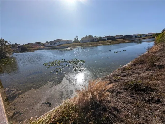 Water view featuring nearby suburban area