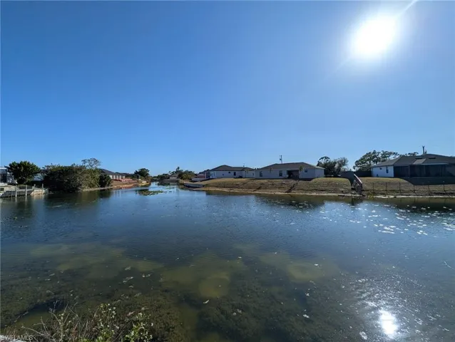 Water view with nearby suburban area