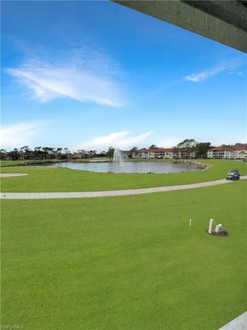 View of home's community with a water view