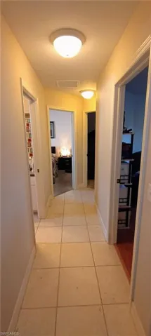 Hallway off family room to secondary bdrms.