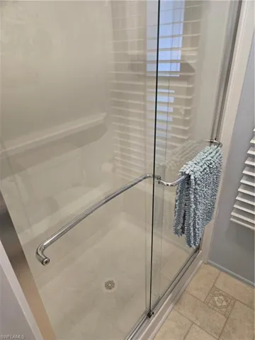 Bathroom featuring an enclosed shower