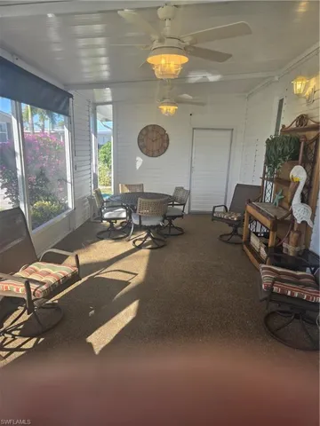Sunroom / solarium with ceiling fan  12 x 23 +/-