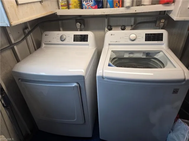 Laundry area with separate washer and dryer