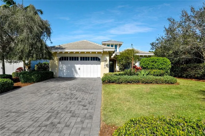 Charming is the description for the front elevation of this beautiful home