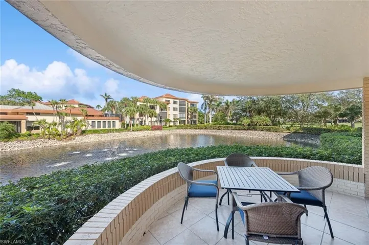View of patio / terrace with a water view