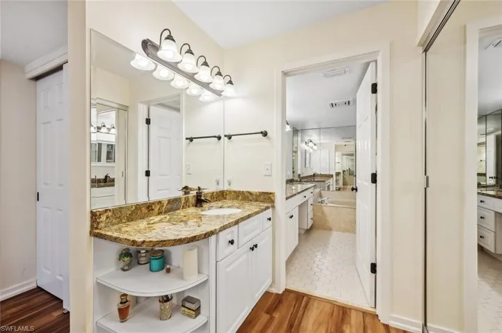 Bathroom featuring hardwood / wood-style floors