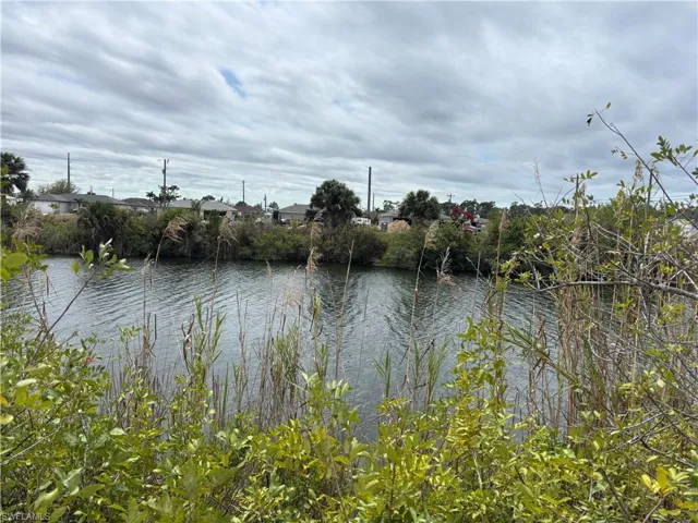 Water view with nearby suburban area