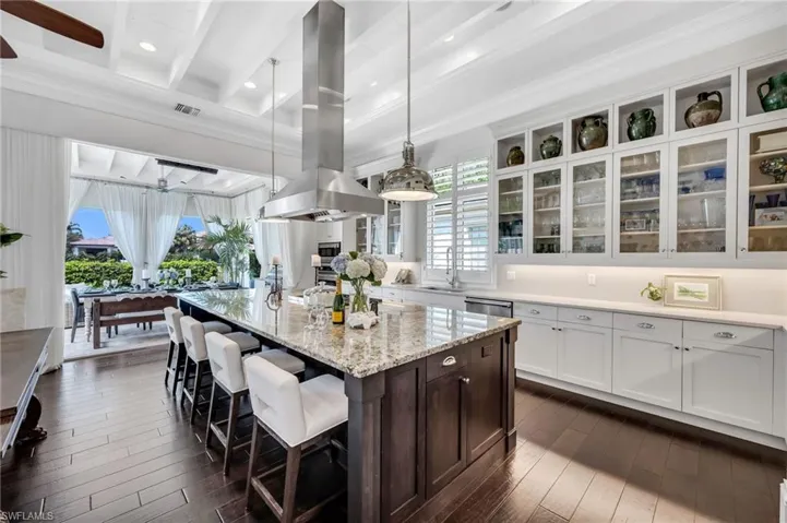 Abundant storage, class cabinets, and top of the line appliances, including and ice maker in the island.