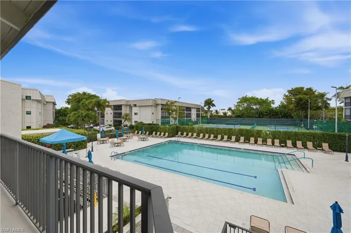 Community pool with a patio area