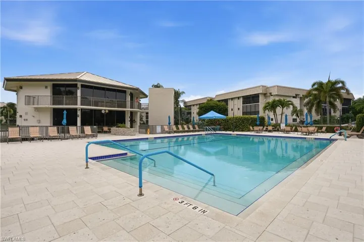Community pool with a patio area