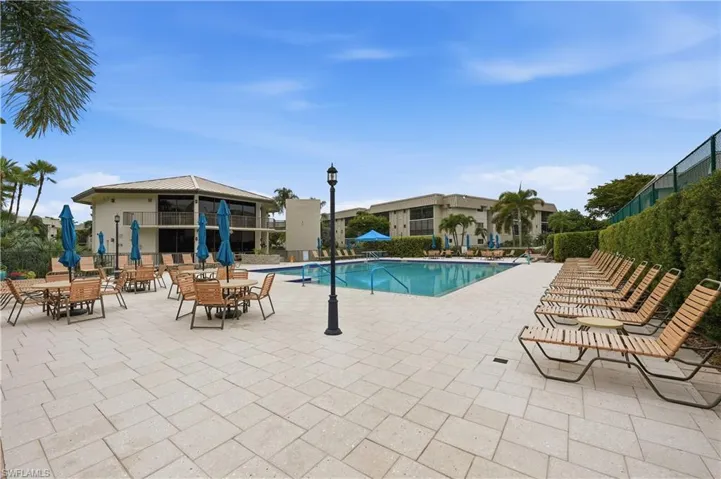 Community pool featuring a patio area