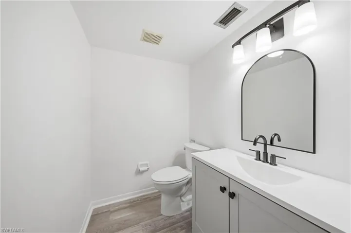 Bathroom with vanity and light wood-style flooring