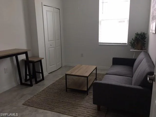 View of tiled living room