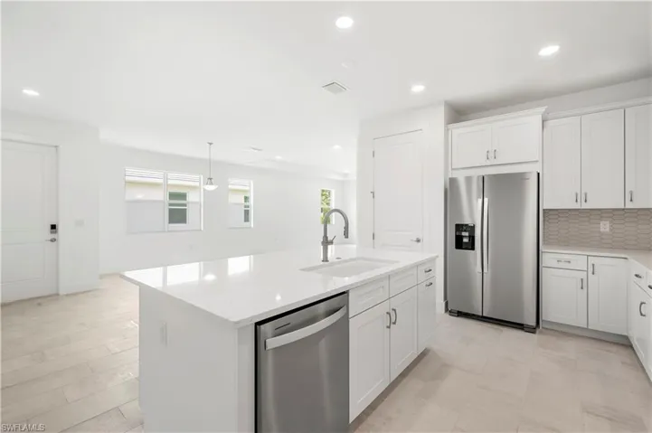 Beautiful, open-concept floor plan with kitchen, casual dining, and great room living