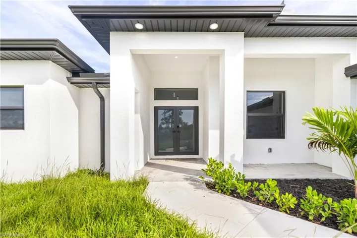 Entrance to property with french doors