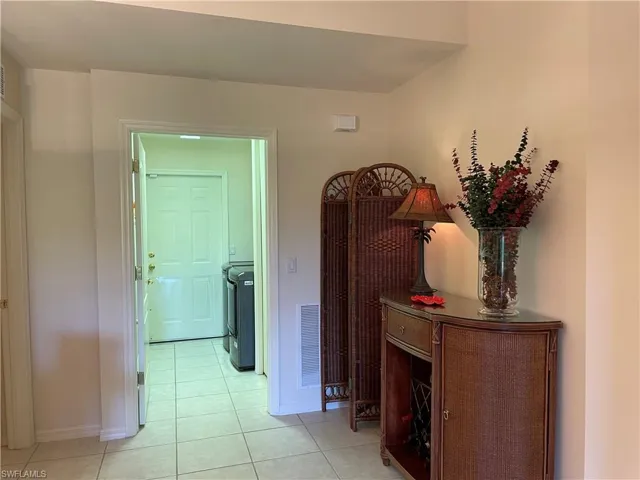 Laundry room and door to garage area