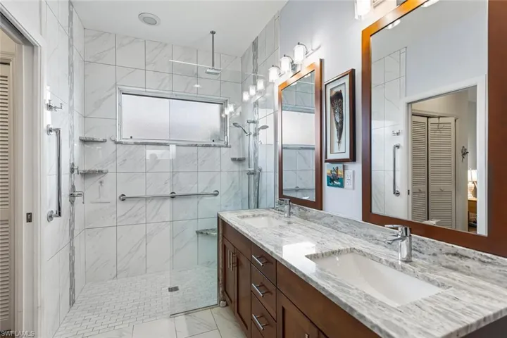 Updated, custom designed bath with walk-in shower.